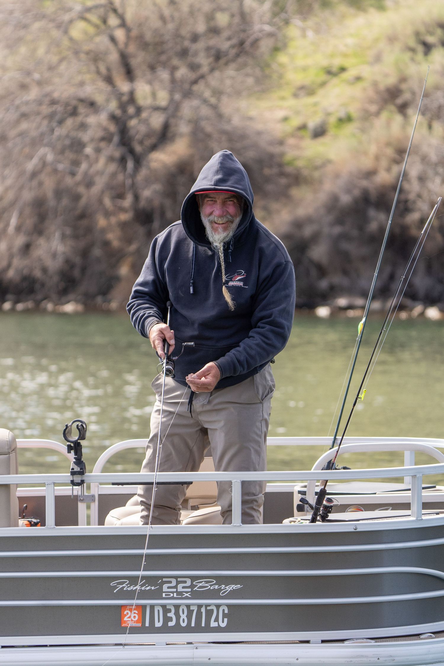 Angler fishing from a pontoon boat during the Crappie Classic at C.J. Strike Reservoir in Idaho