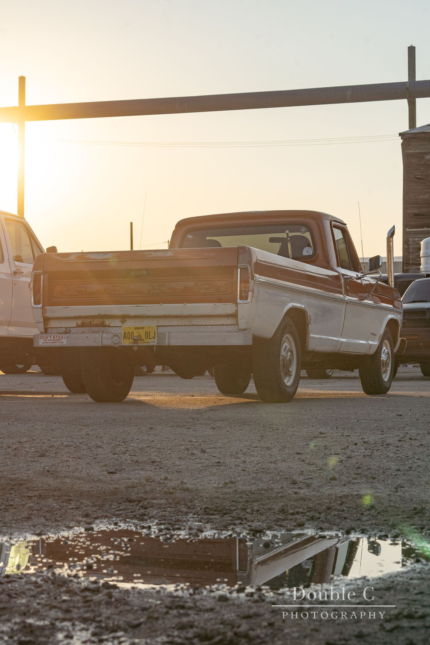 Custom Ford truck on display at sunset during Idaho Truck Invasion