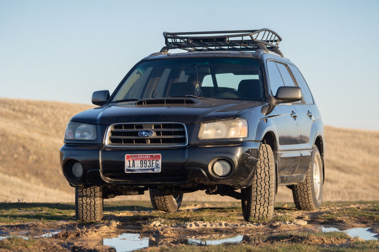 Off-road SUV parked in an open Idaho landscape
