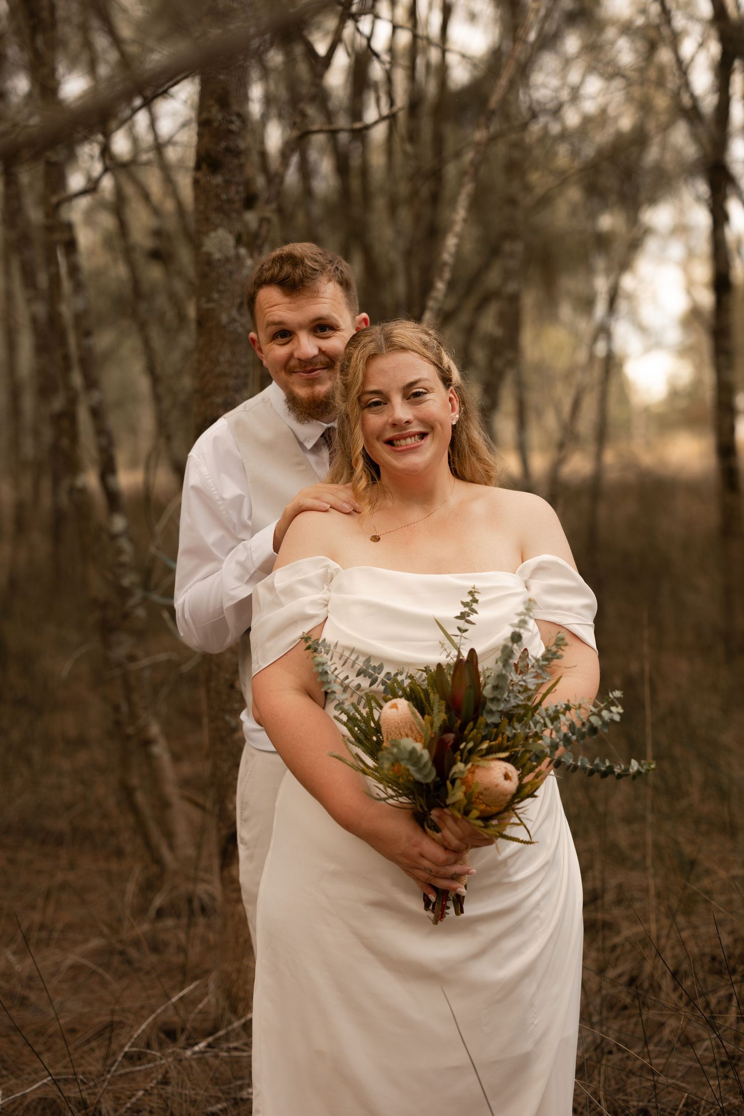 Authentic intimate wedding photography in Jervis Bay, capturing heartfelt moments against stunning beach, bush and coastal backdrops.