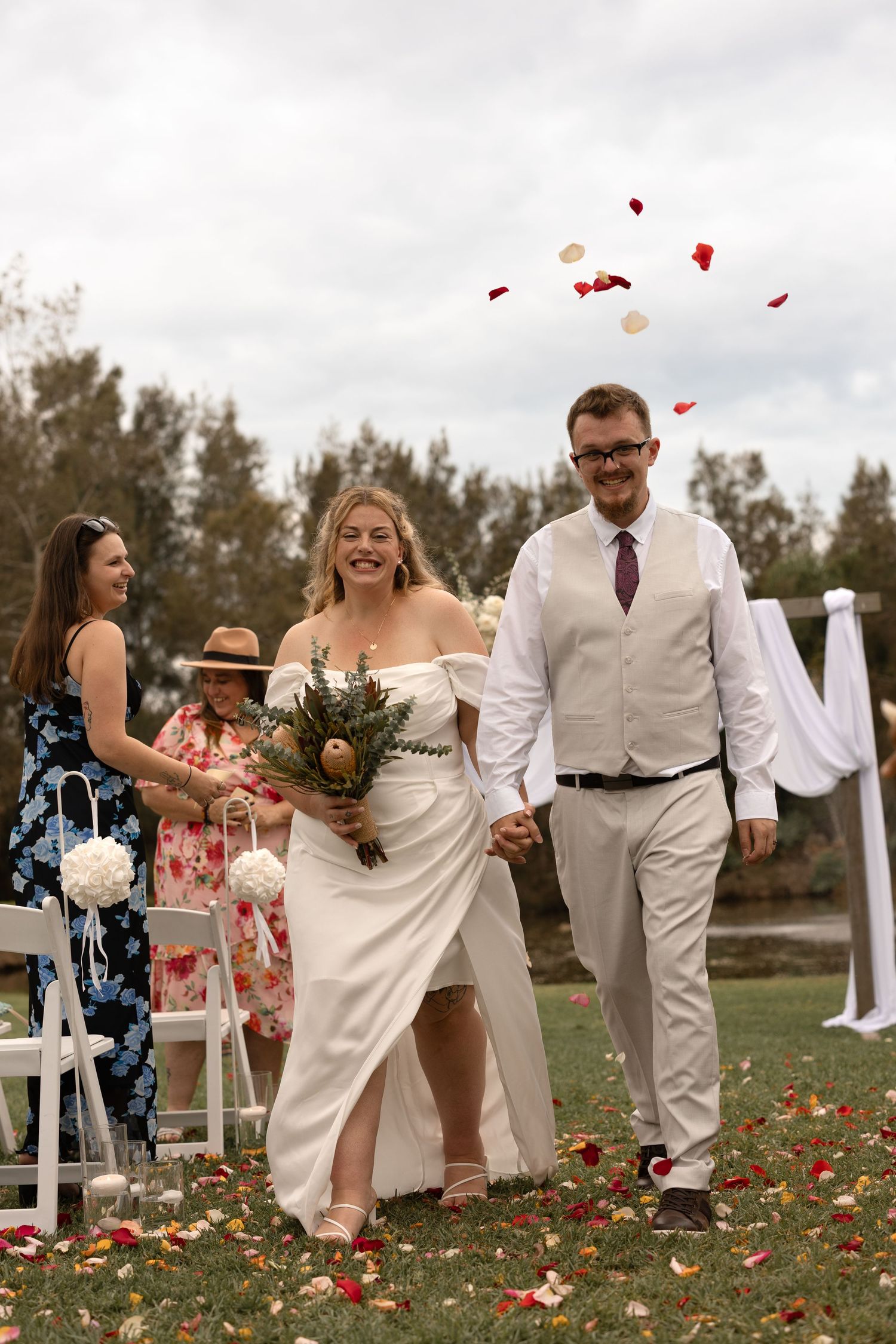 Authentic intimate wedding photography in Jervis Bay, capturing heartfelt moments against stunning beach, bush and coastal backdrops.