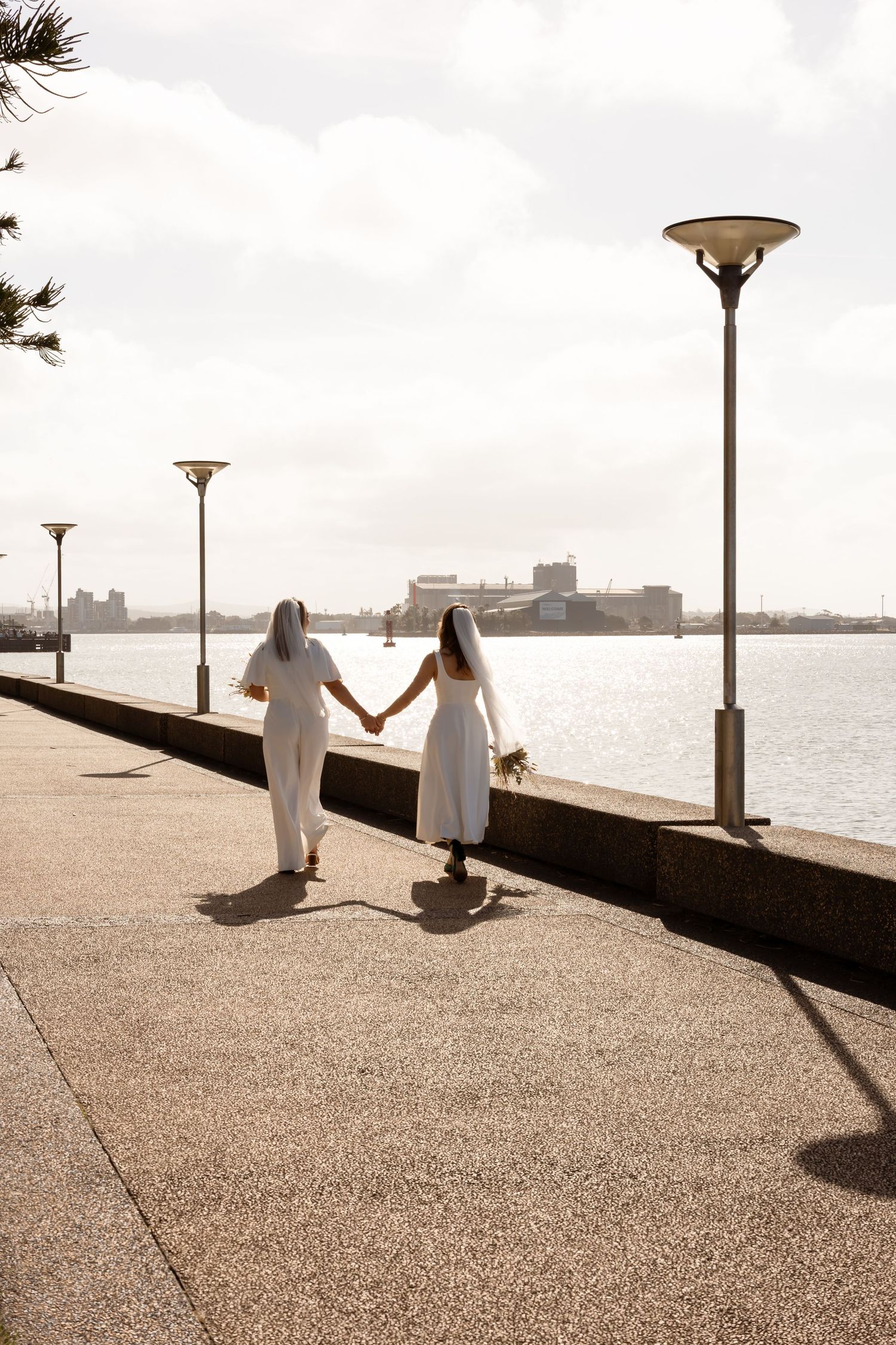 Authentic intimate wedding photography in Jervis Bay, capturing heartfelt moments against stunning beach, bush and coastal backdrops.