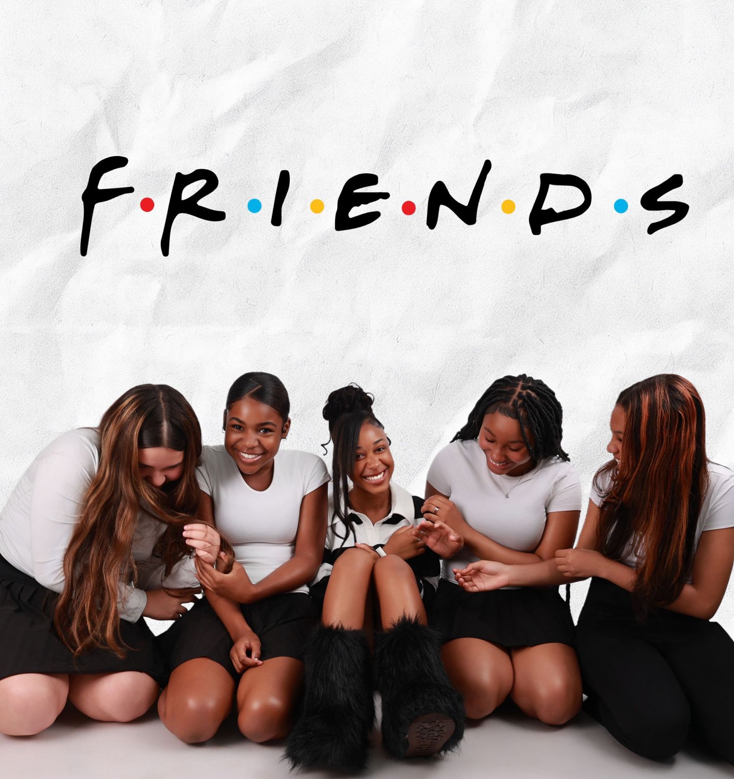 Five young girls pose together under the iconic FRIENDS TV show logo in a fun group photo.