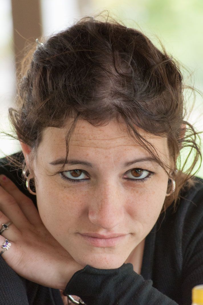 young woman staring at the viewer