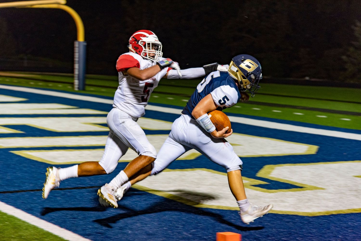 football player crossing the goal line