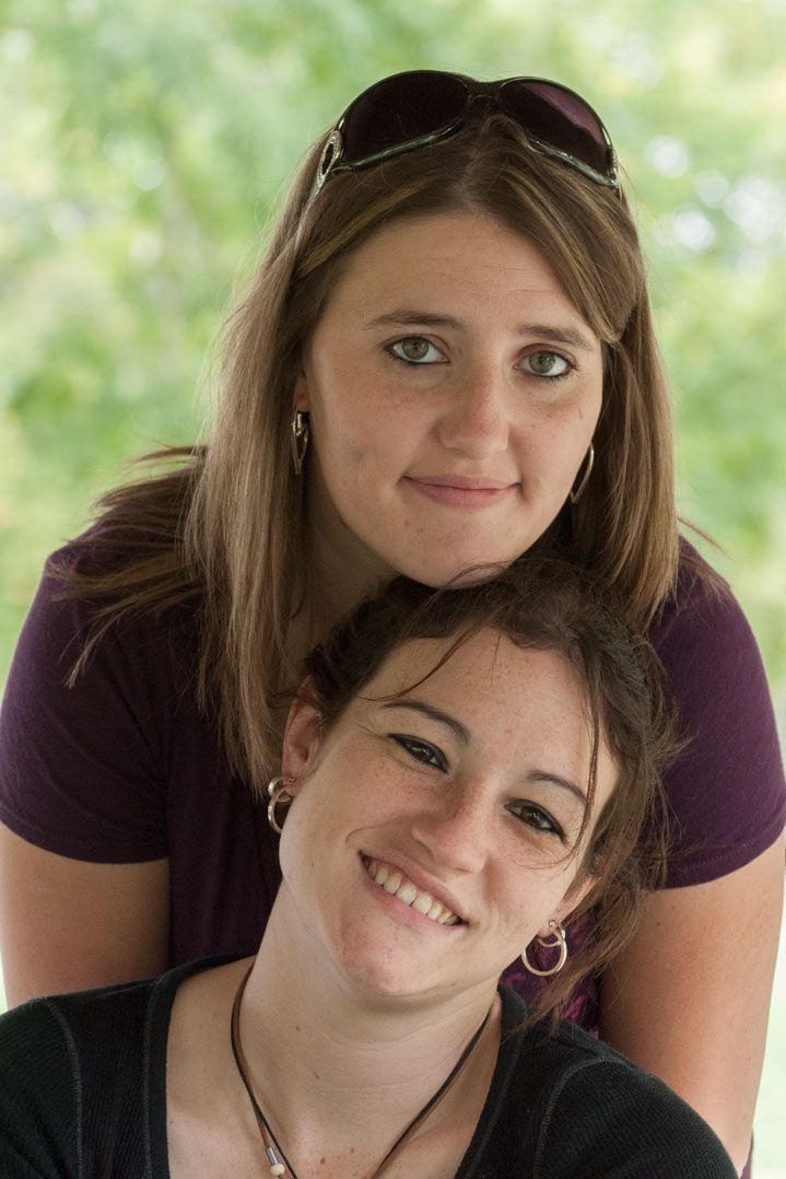 Two young women posing