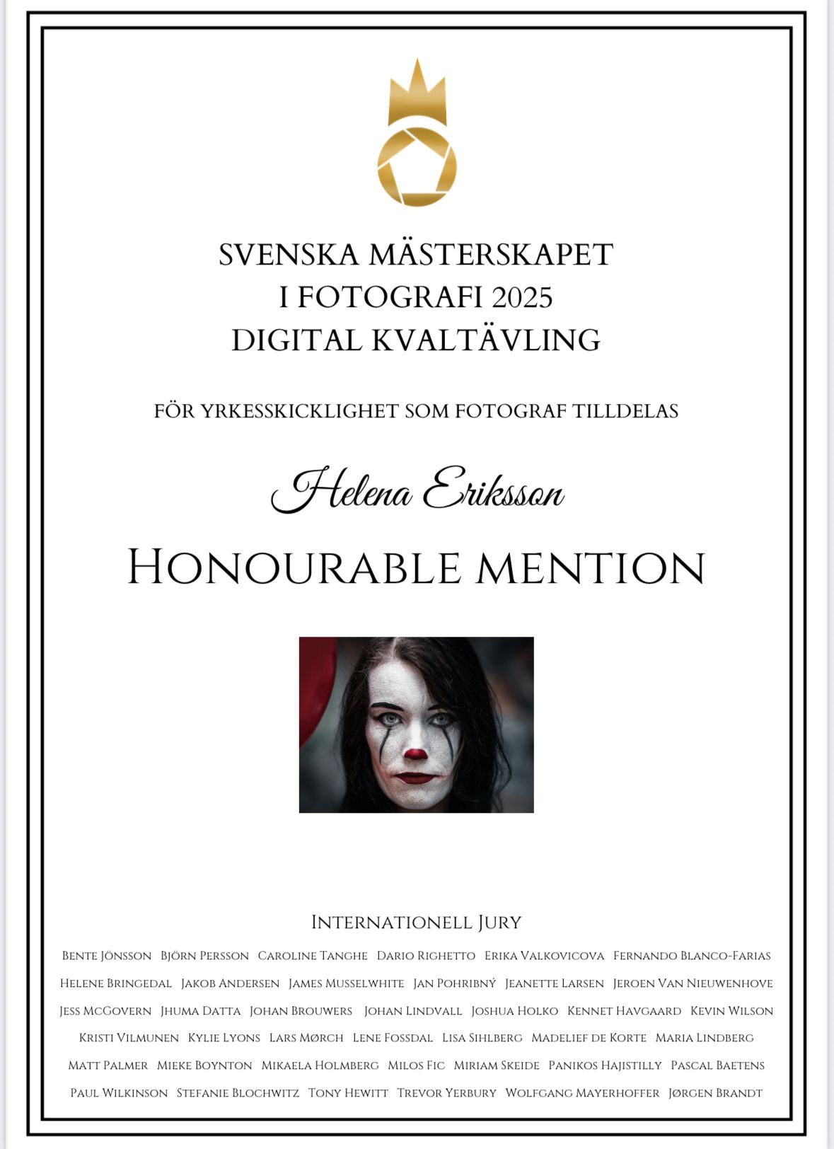 A collection of photography award certificates with gold accents and an artistic portrait displayed.