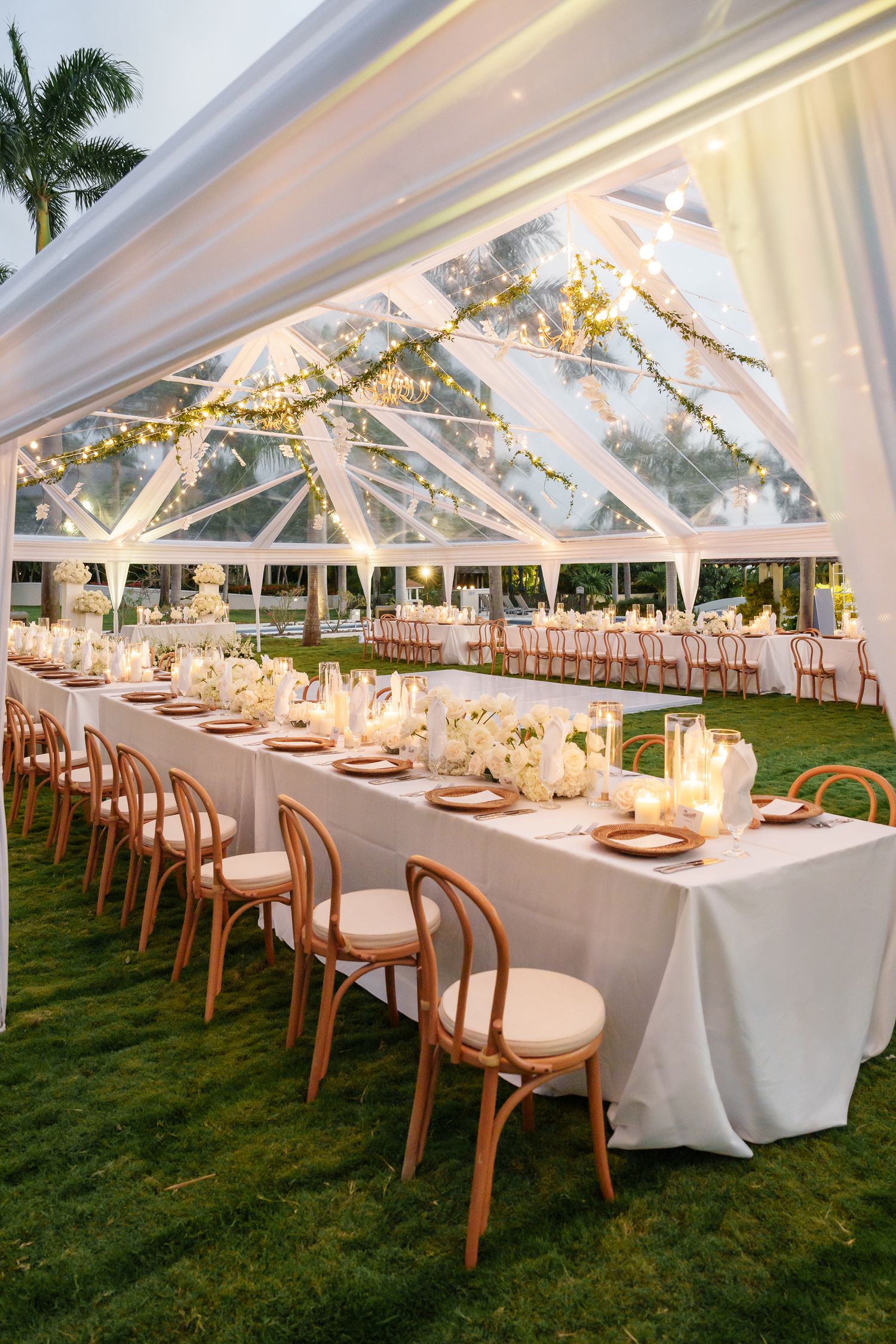 Open-air wedding reception with string lights at The Cliff Hotel, Negril