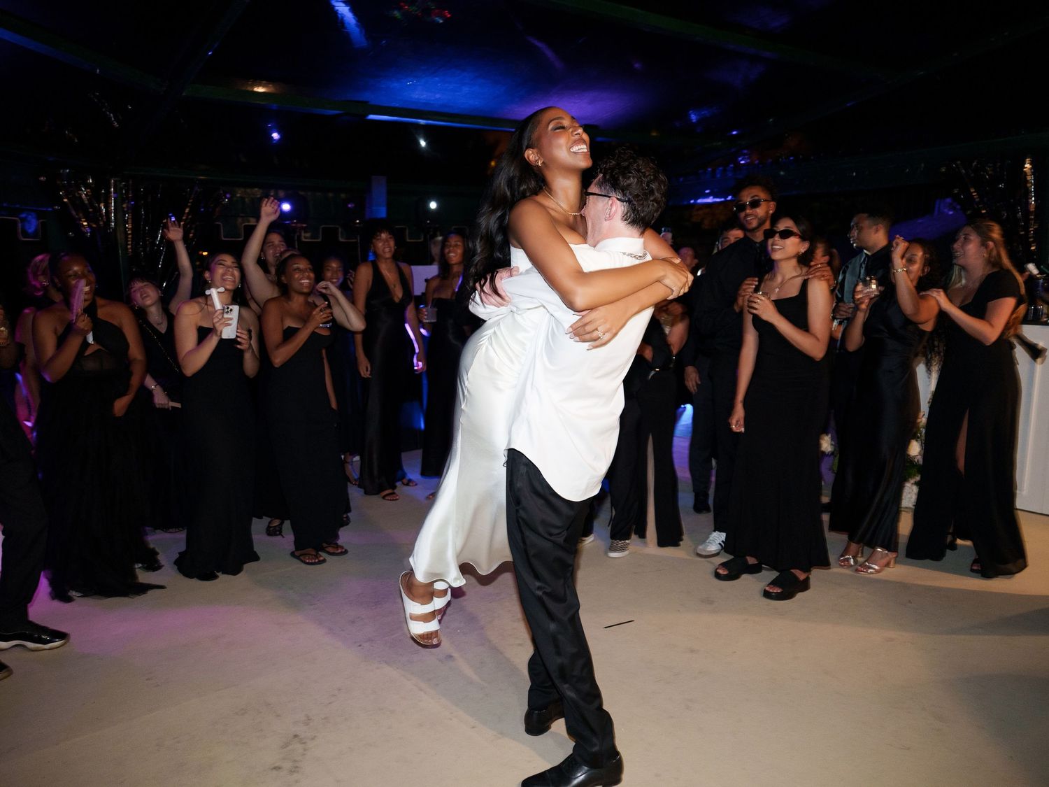 A sequence of dance moves showing couples performing lifts and spins during a ballroom dance competition.