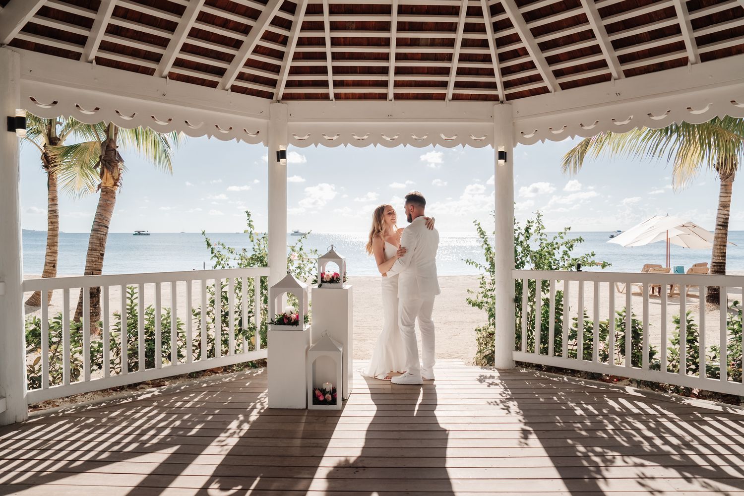 Panoramic view of a beachfront gazebo with the elopement couple photographed by Olga Sam wedding photographer in Negril Jamaica