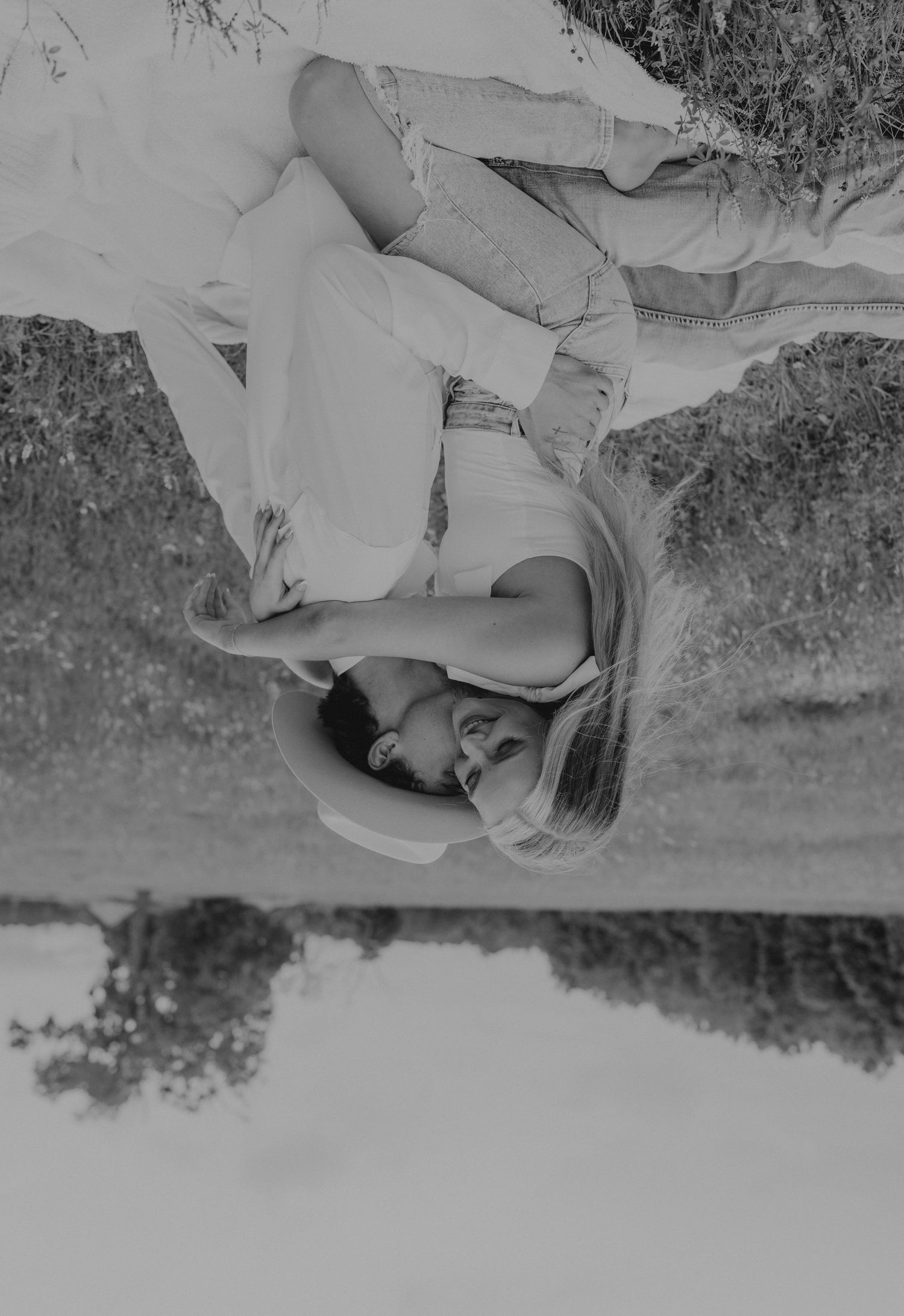 Black and white upside down portrait in artistic composition with natural scenery.