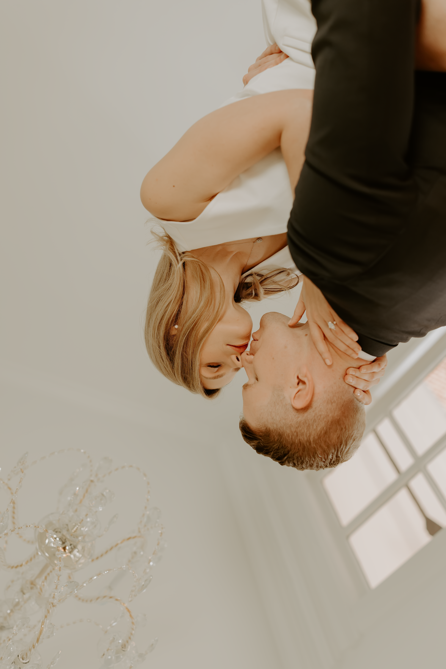 An intimate upside-down portrait of a couple in warm lighting.

Georgia-based wedding and elopement photographer traveling throughout the Ea