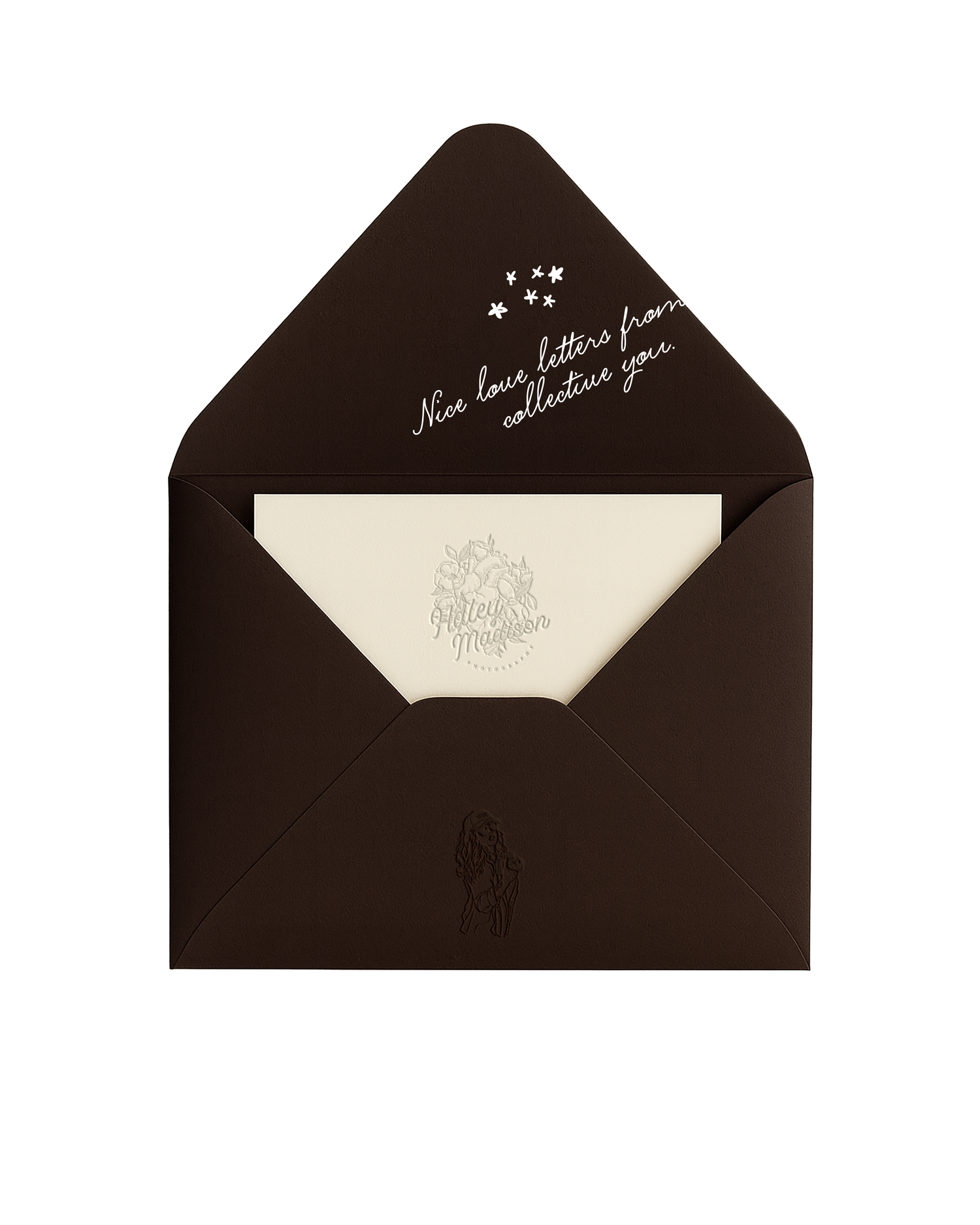 Dark brown envelope with white letter inside, featuring silver star details and elegant cursive text on the inner flap.