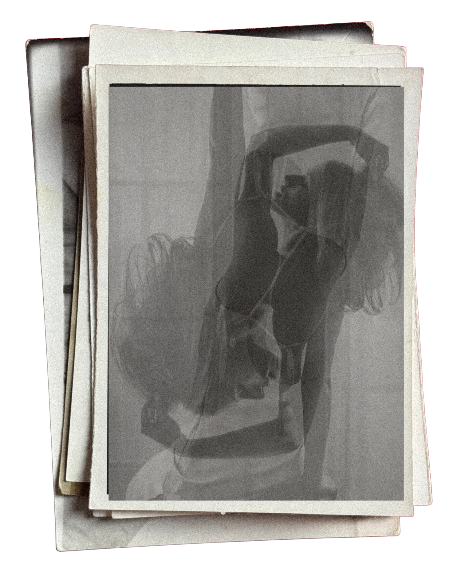 Vintage black and white photo stack showing a blurred double exposure of a person posing gracefully.