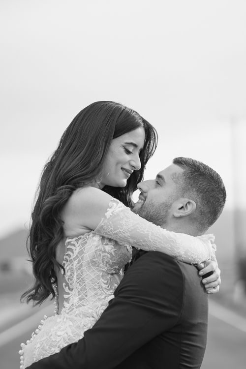 A romantic black and white wedding photo sequence shows a couple sharing tender kisses and embraces.