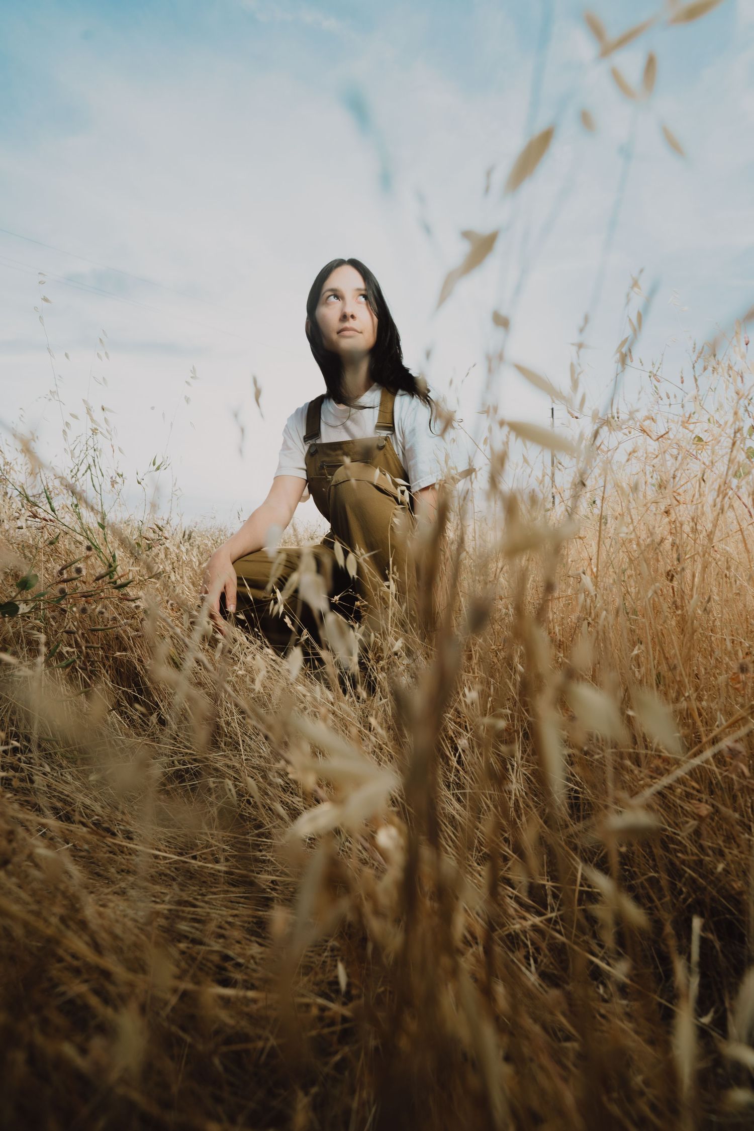 A woman in a wheat firls