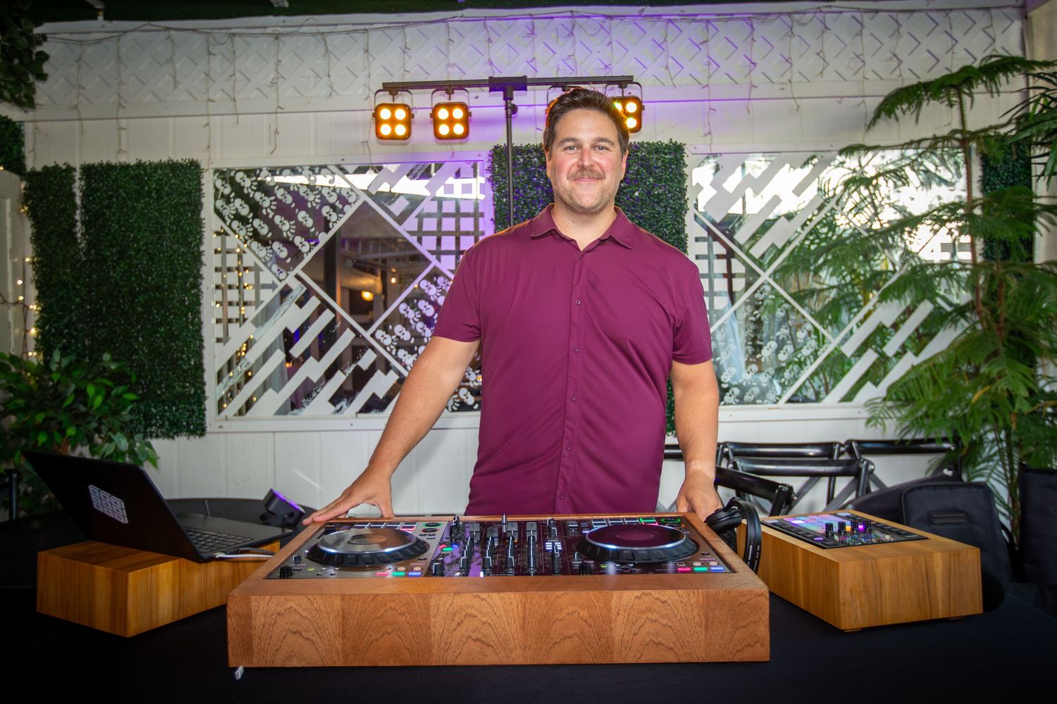 DJ mixing live music during an energetic party event in Durham, captured in action.