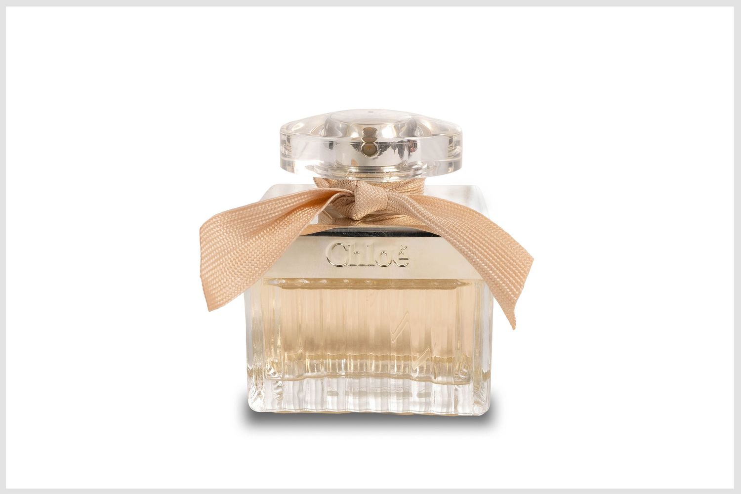 High-end product photo of a women’s perfume bottle with elegant lighting.