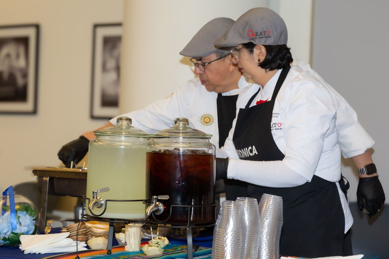 Chefs organizing gourmet dishes during a high-end catering event in the Triangle area.
