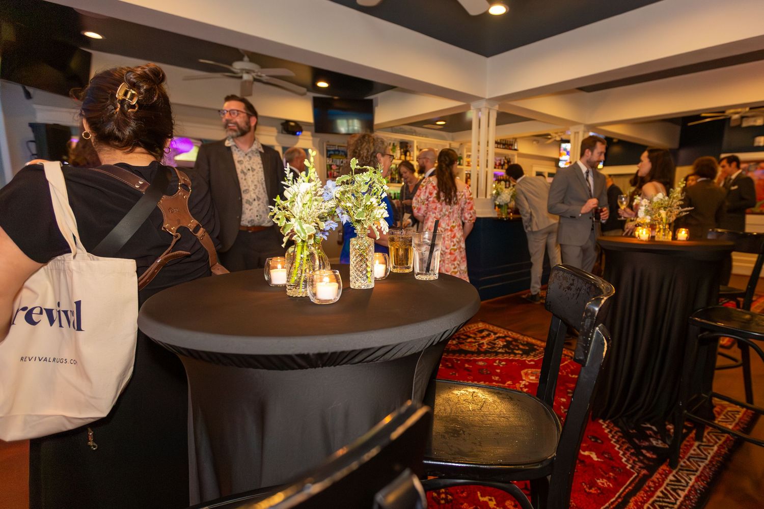 Guests enjoying an indoor reception during a celebration — event photography by Triangle Photo Pro in Chapel Hill.