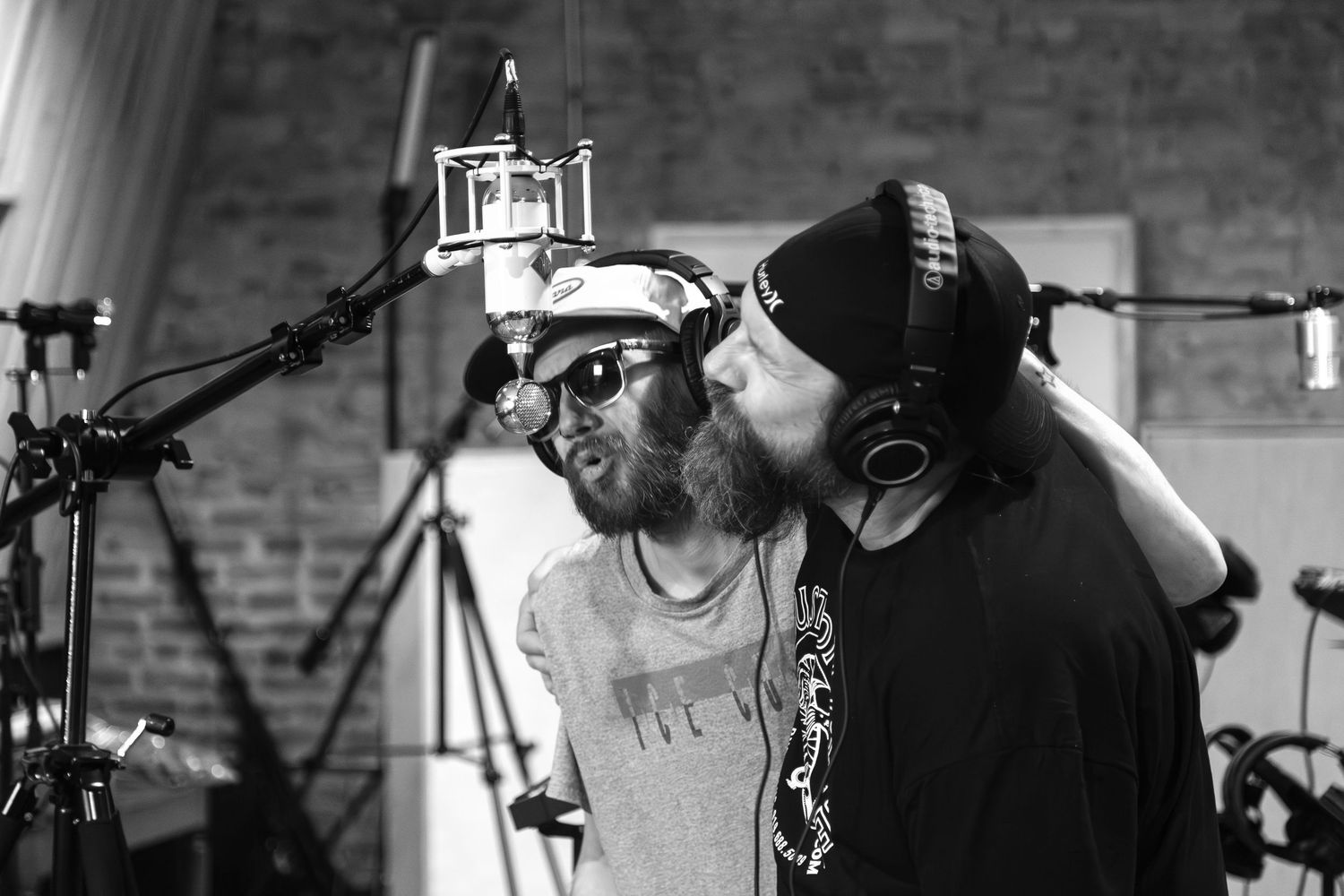 Two singers sharing a microphone during a live performance — event photography in Durham by Triangle Photo Pro