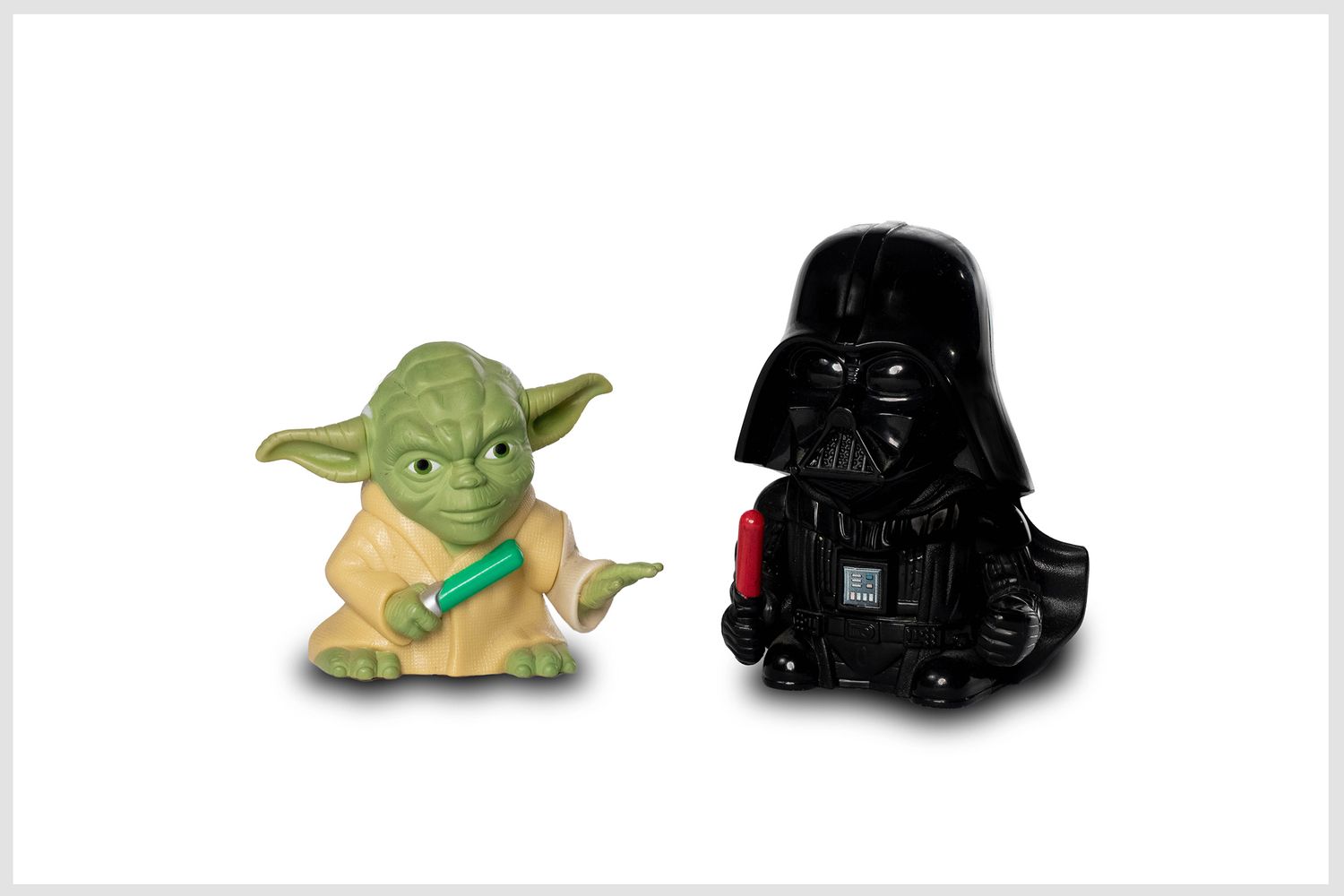 Detailed product photo of collectible figurines in a studio setup.