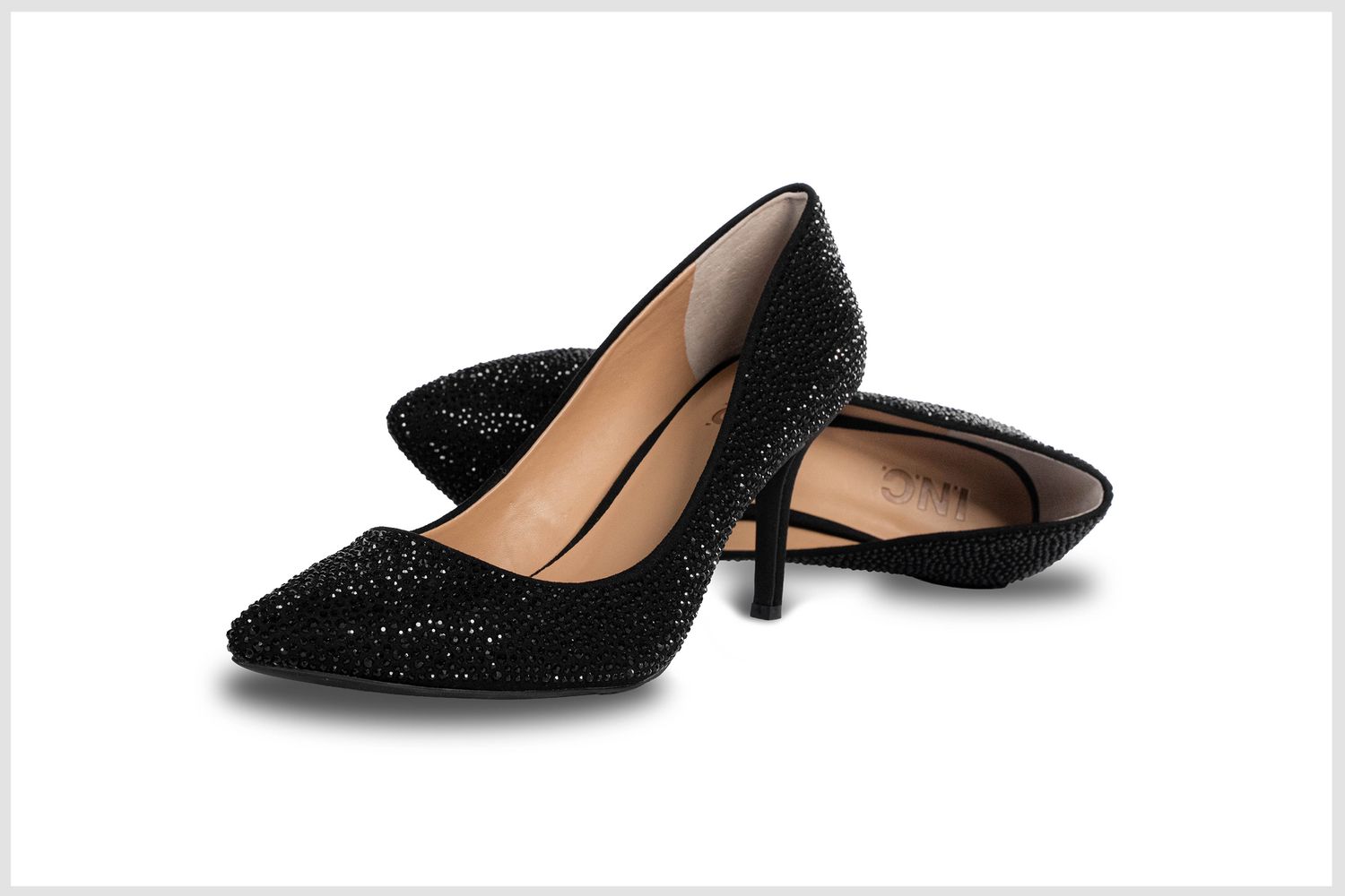 Stylish women’s party shoes photographed professionally for catalogs.
