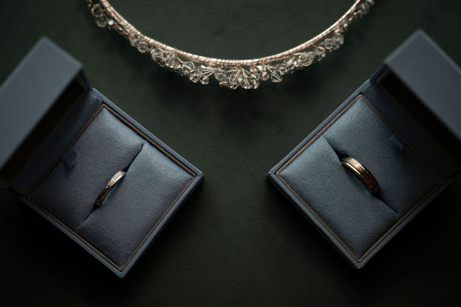 Elegant vintage-style mirror frames displayed on a dark background.