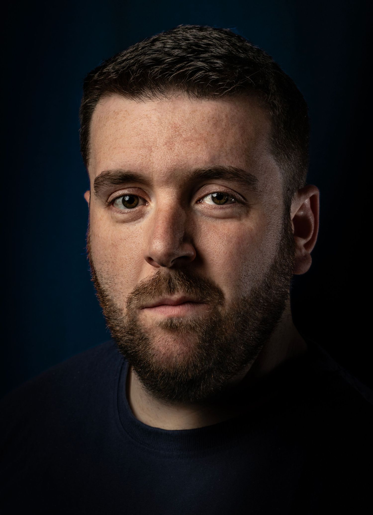 Black and white portrait series showing dramatic side lighting on a bearded man against dark background.