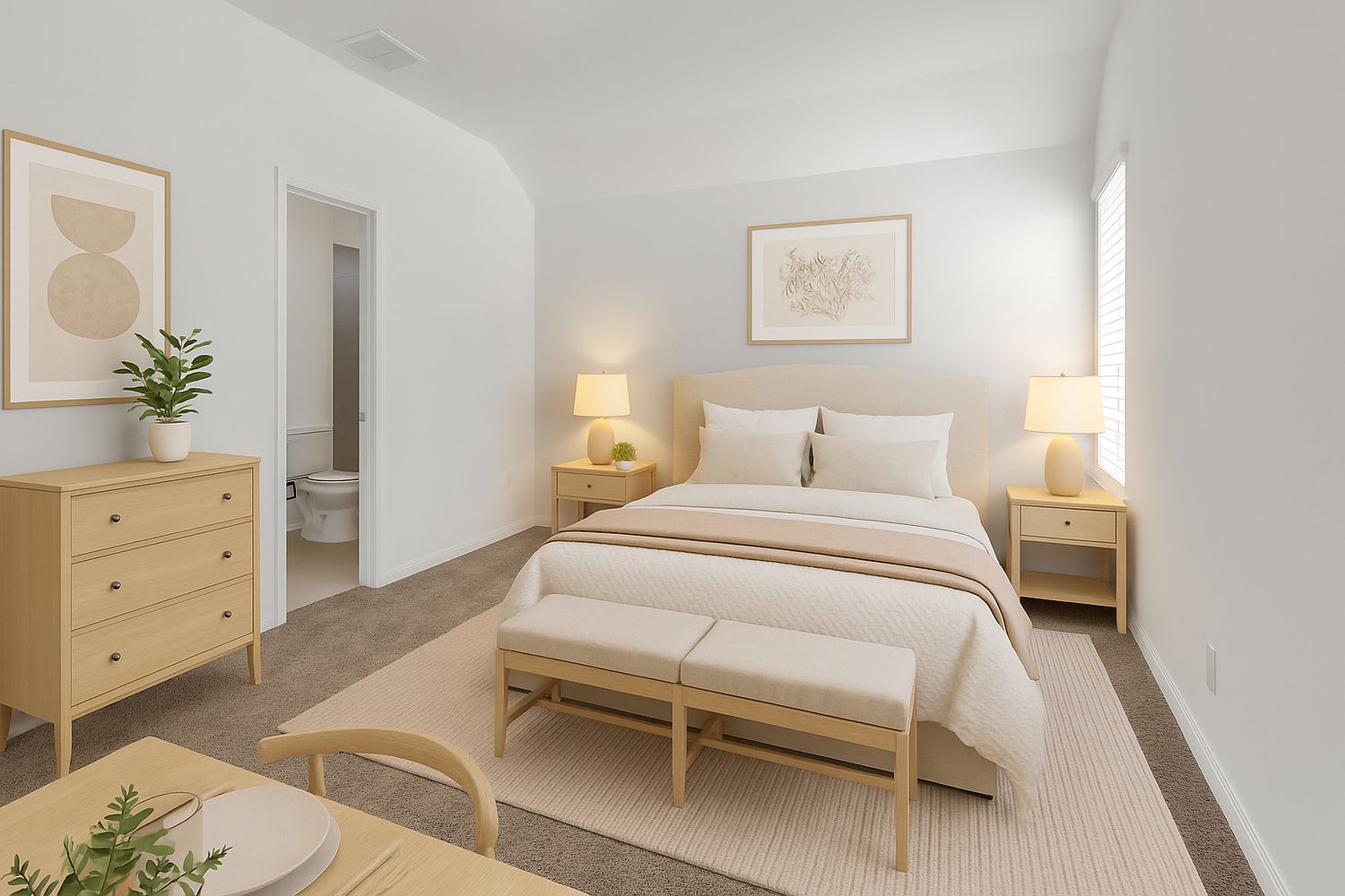 Modern minimalist bedroom with white walls, beige furniture, framed art, and natural light creating a serene atmosphere.