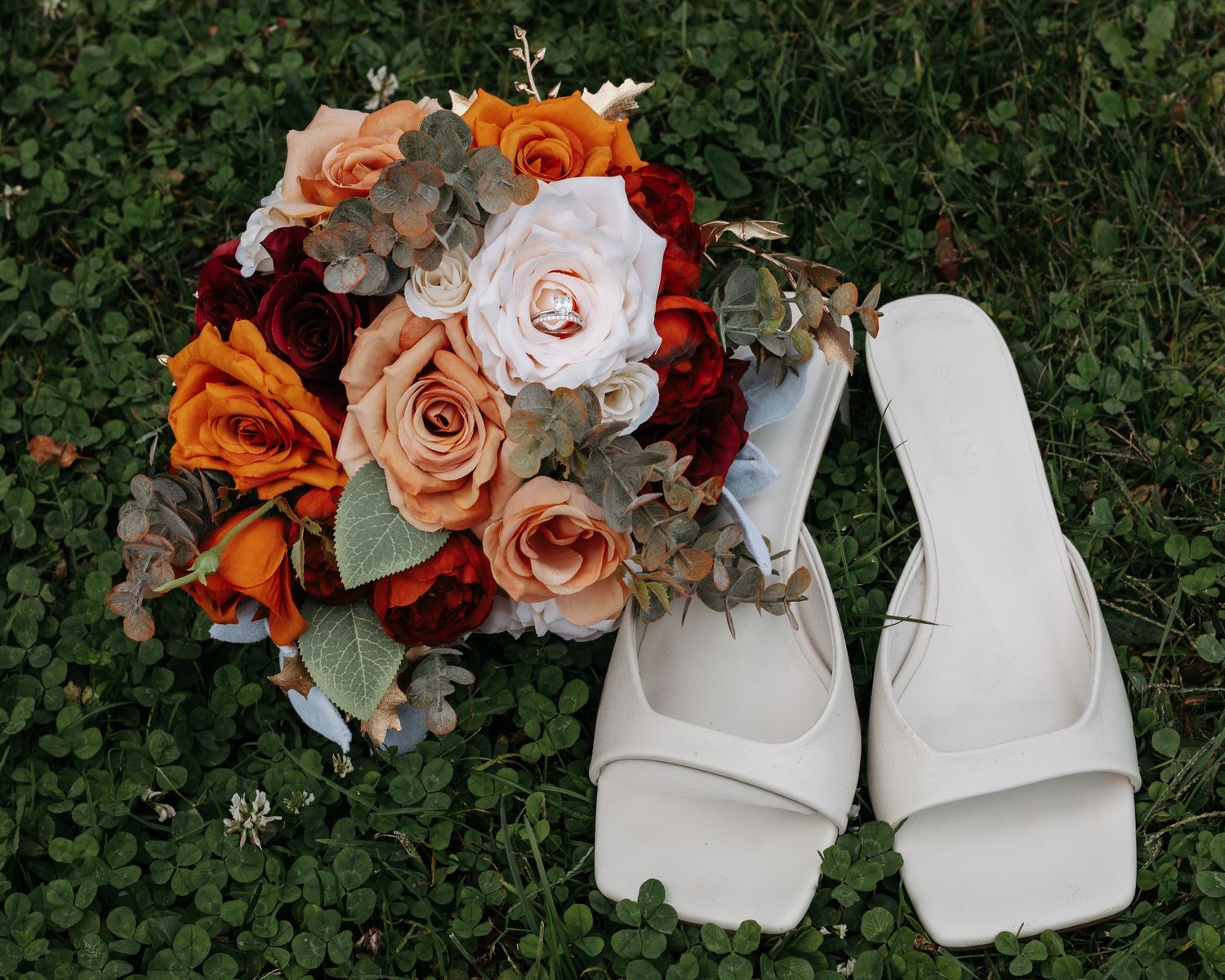 Elopement session shoes and flowers with ring
