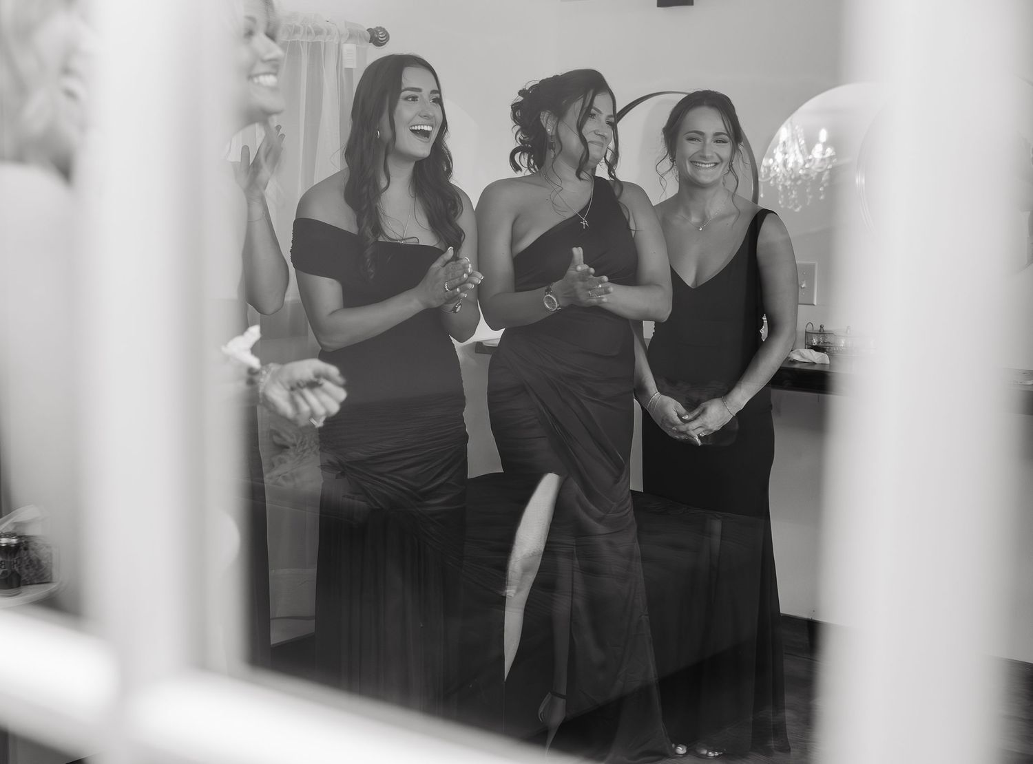 Bridesmaid seeing bride in her wedding gown for the first time