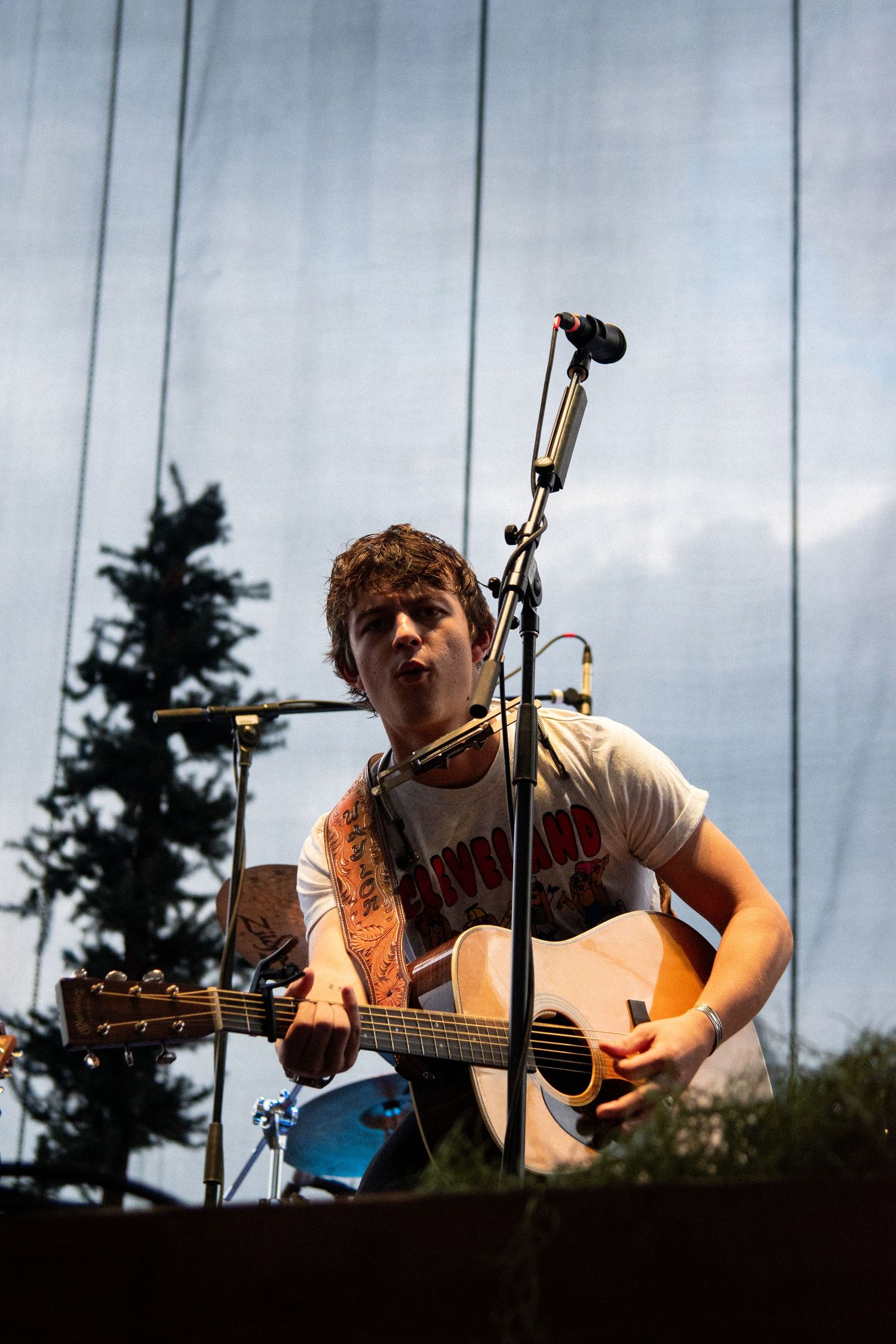 Concert photograph capturing a musician during a live performance