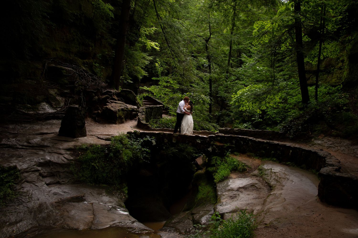 Newlyweds sharing a quiet moment during their Hocking Hills elopement