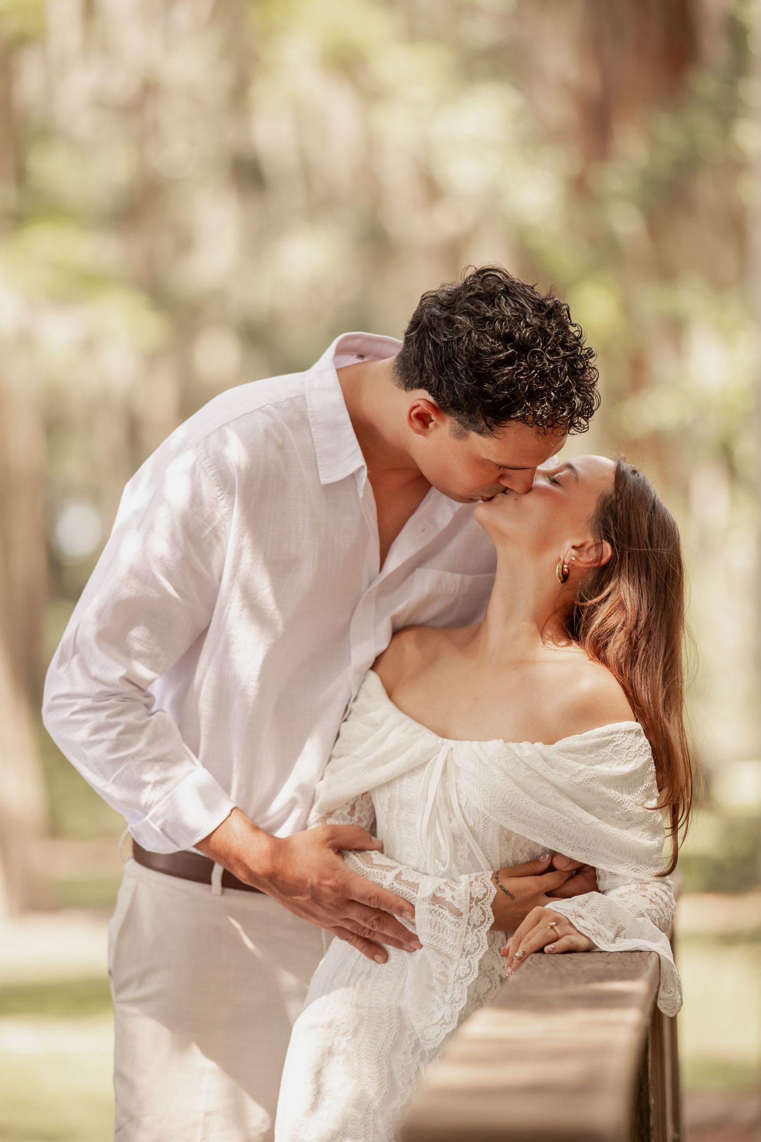 Romantic engagement portraits at Kraft Azalea Garden in Winter Park, Florida.