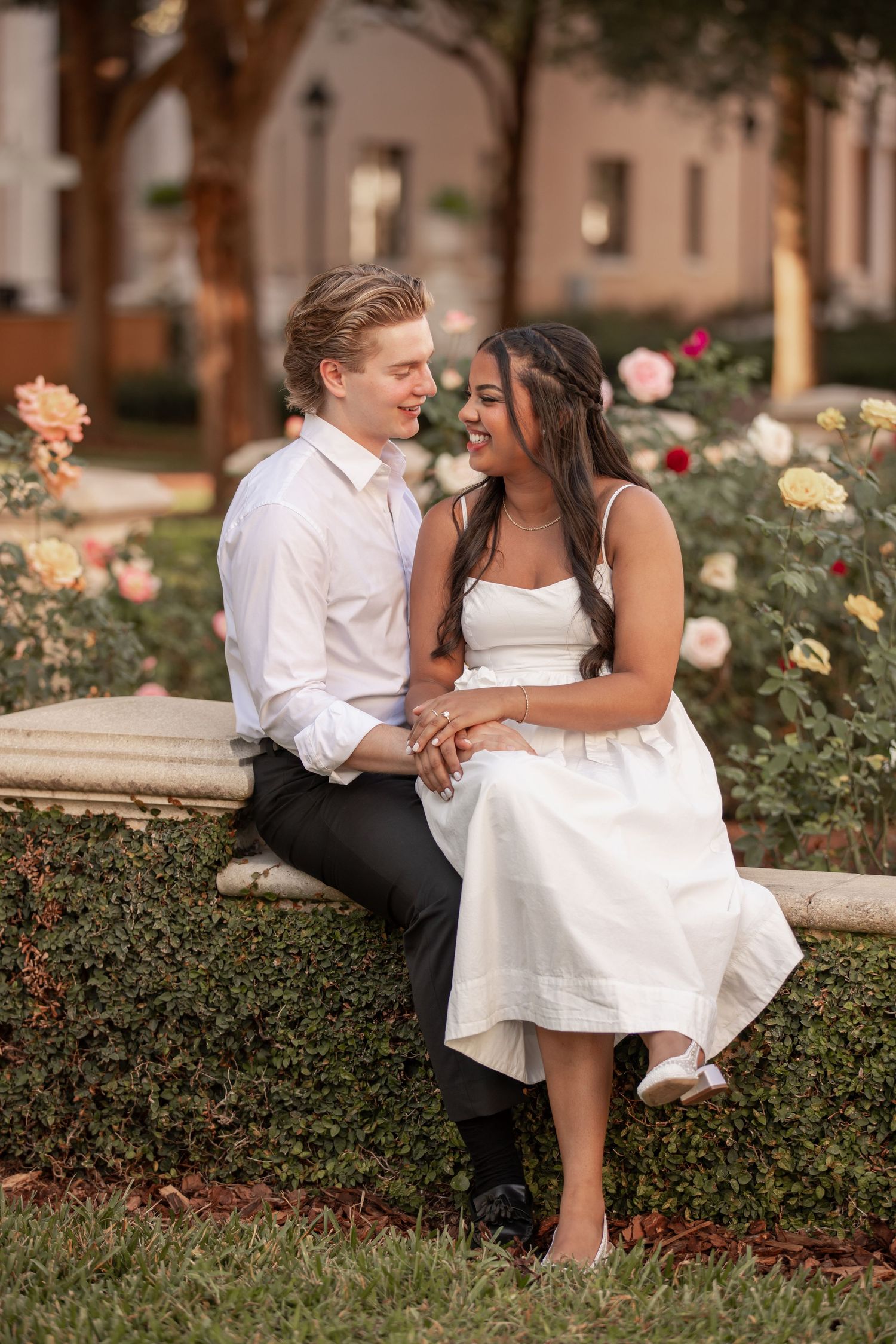 Romantic engagement portraits of a couple at Rollins College.