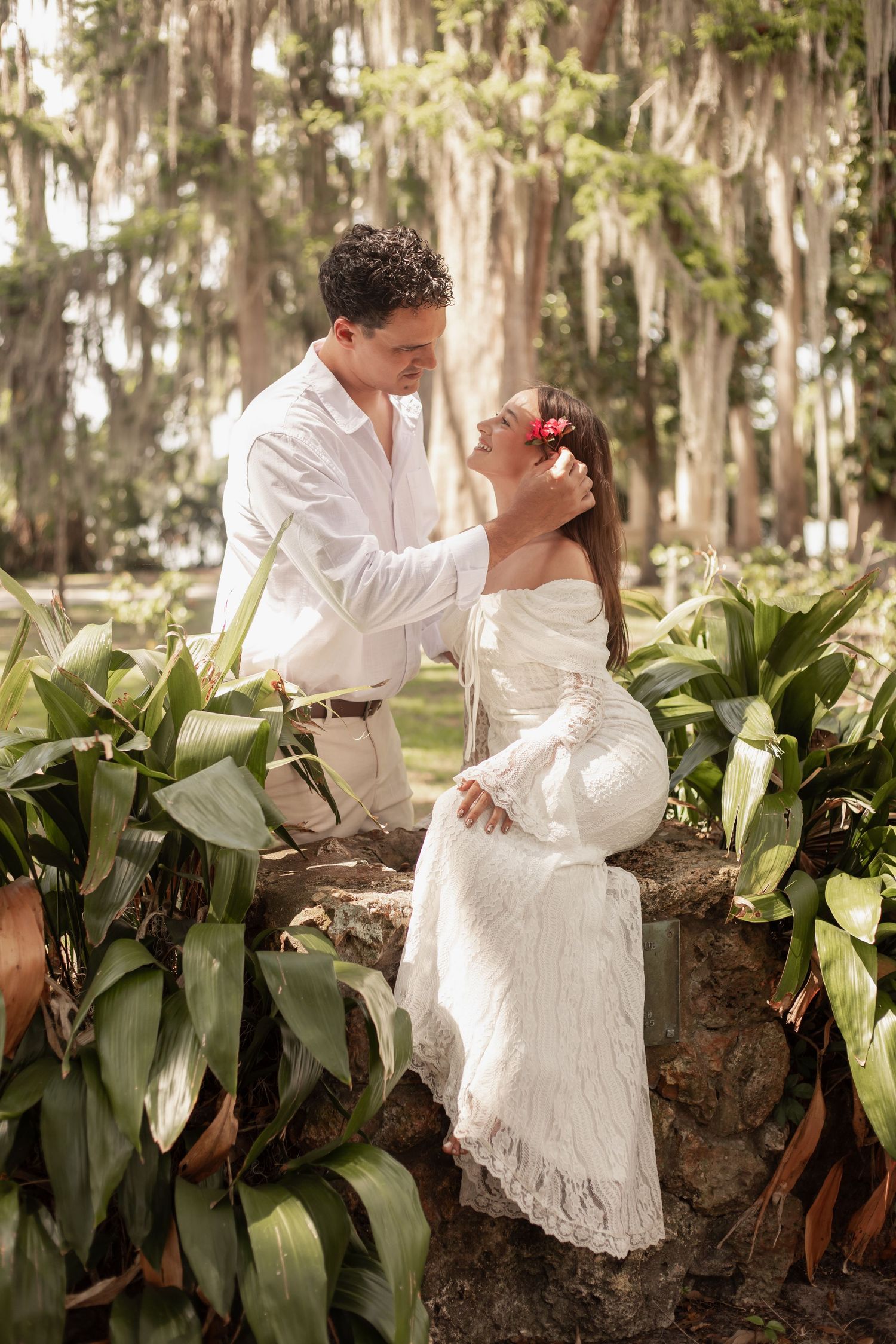Romantic engagement portraits at Kraft Azalea Garden in Winter Park, Florida.