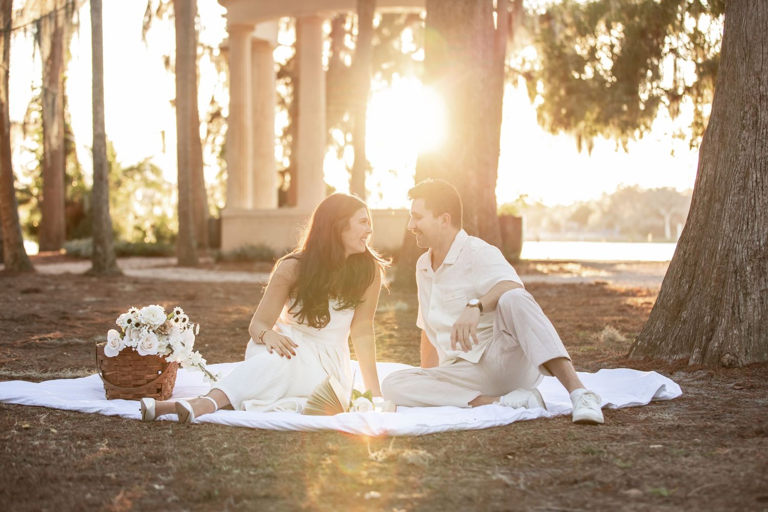 Joyful engagement session under Spanish moss at Kraft Azalea Garden