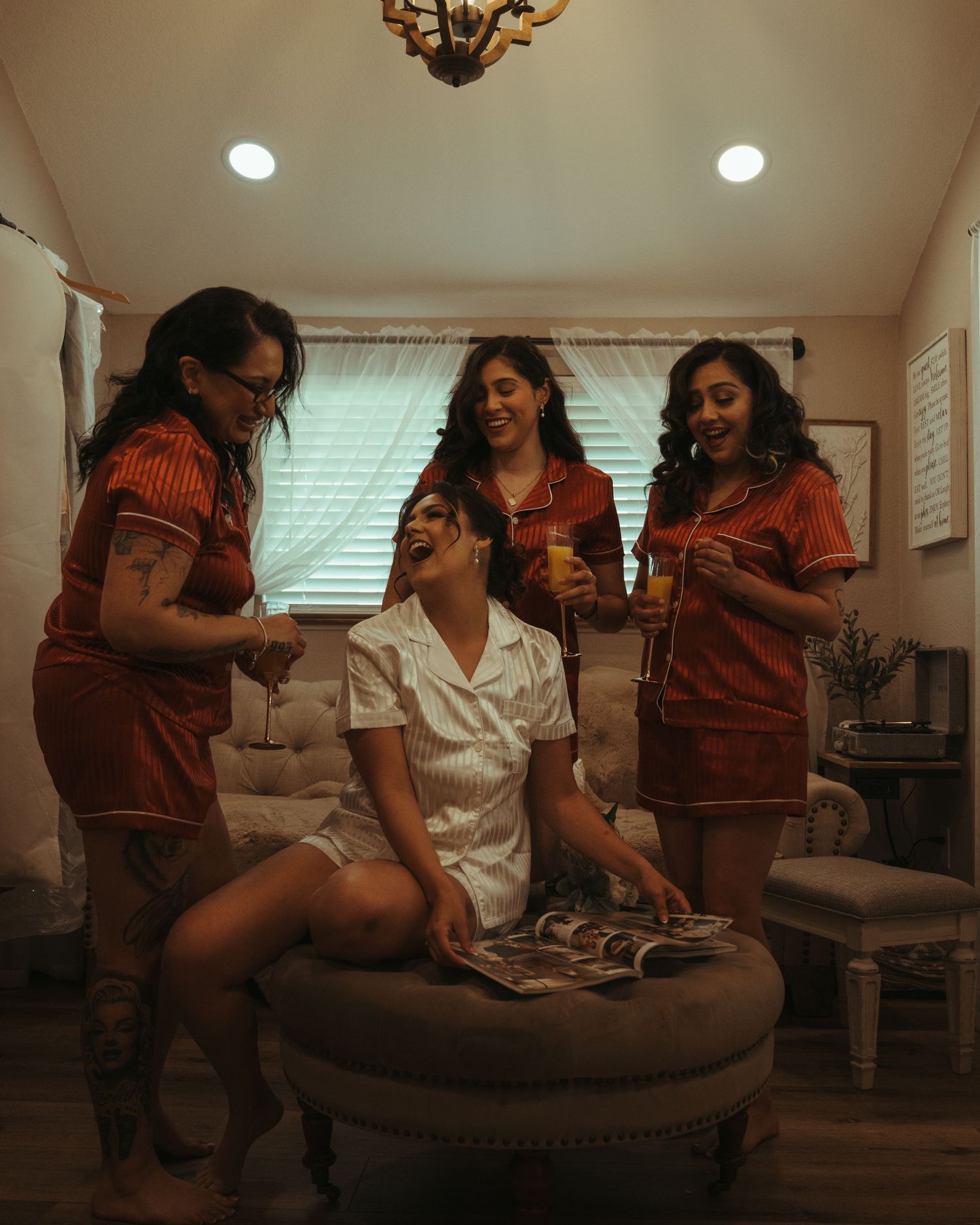 Intimate pre-wedding preparation scene in a warmly lit room.