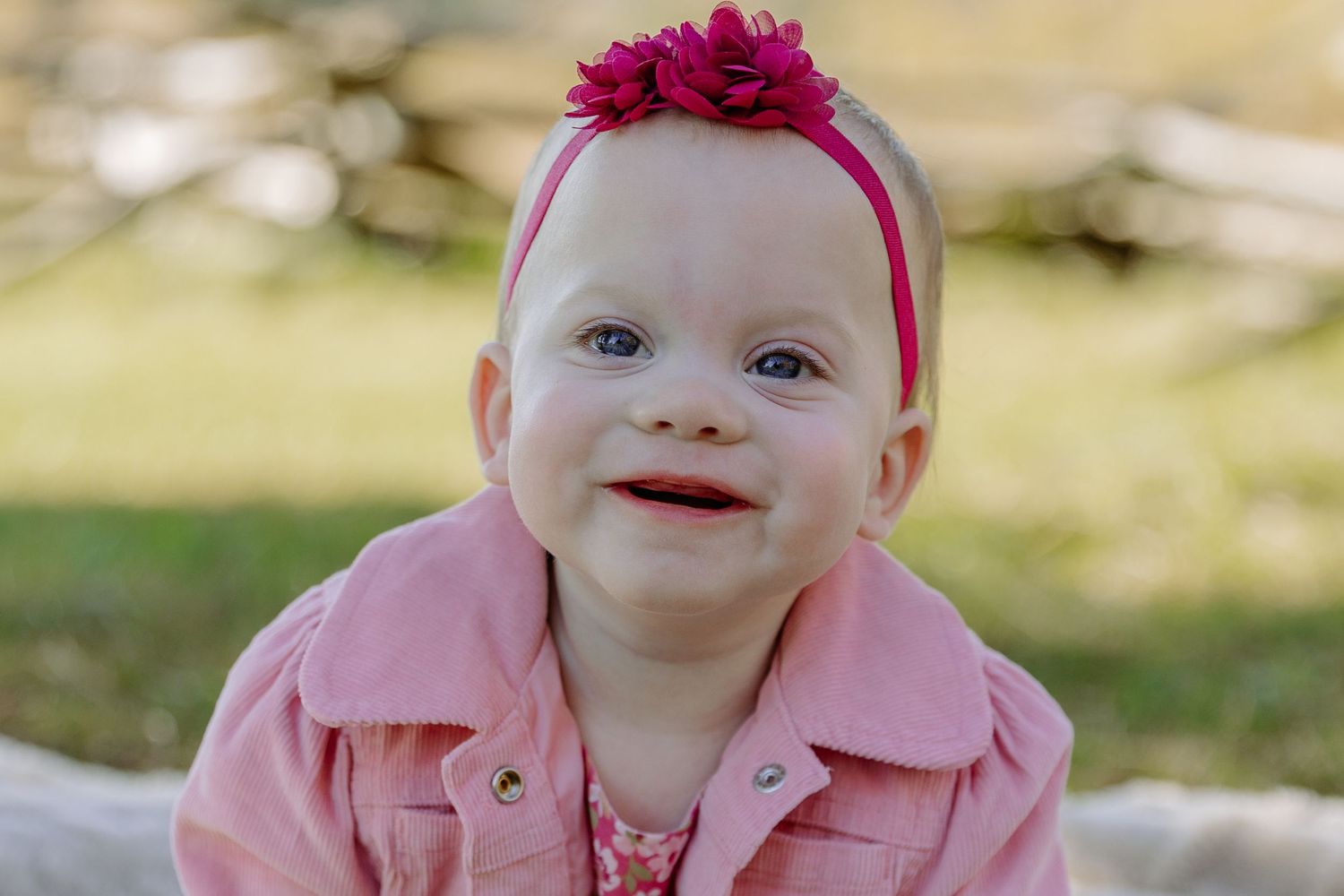 Sweet baby portraits featuring pink accessories against a soft natural background.