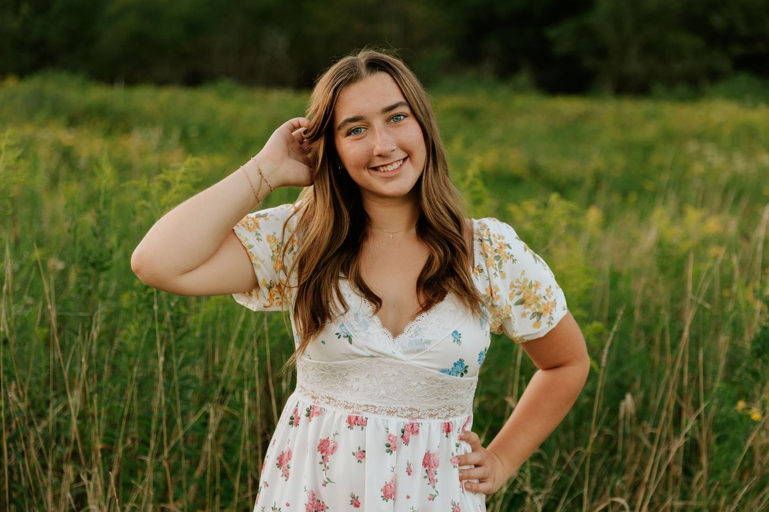 A series of outdoor portraits in a sunny field with flowering plants.