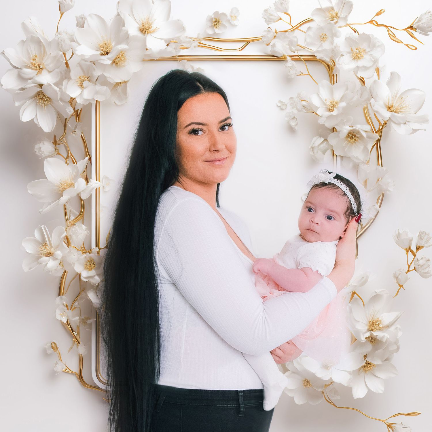 Studio portraits with floral backdrop showing parent and baby in white attire.