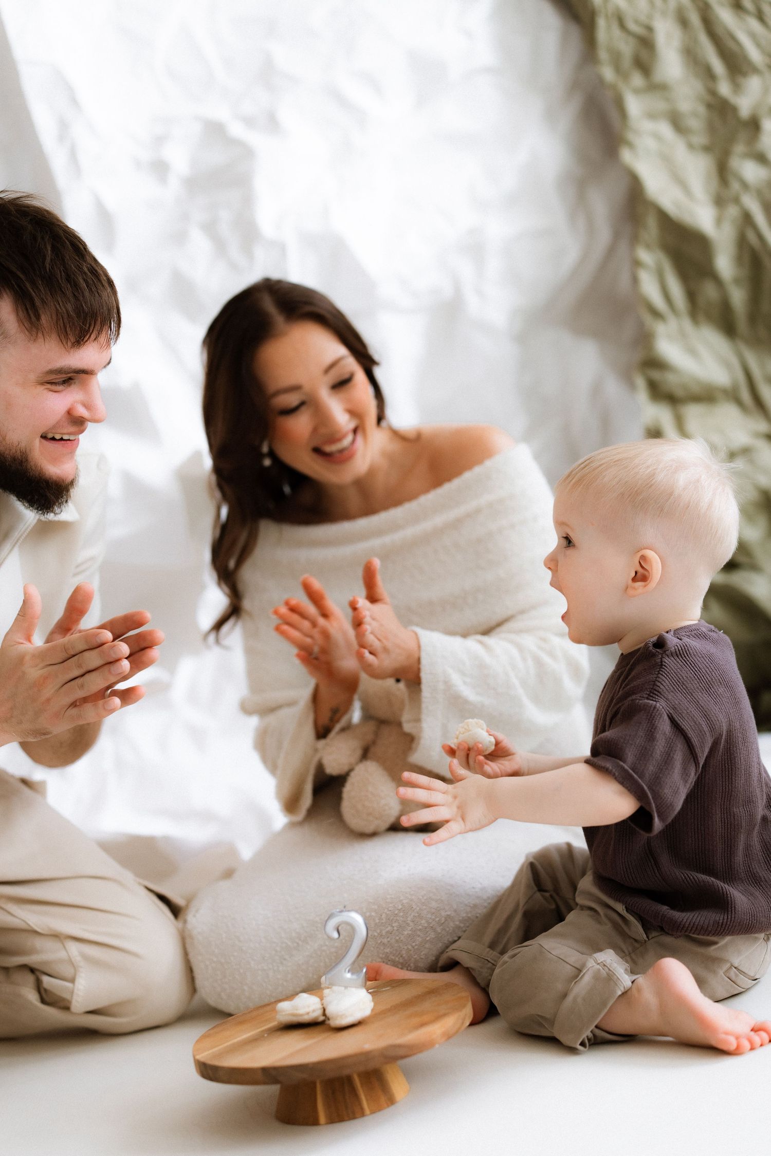 A series of candid lifestyle photos showing intimate moments between people sitting together in white and gray clothing.