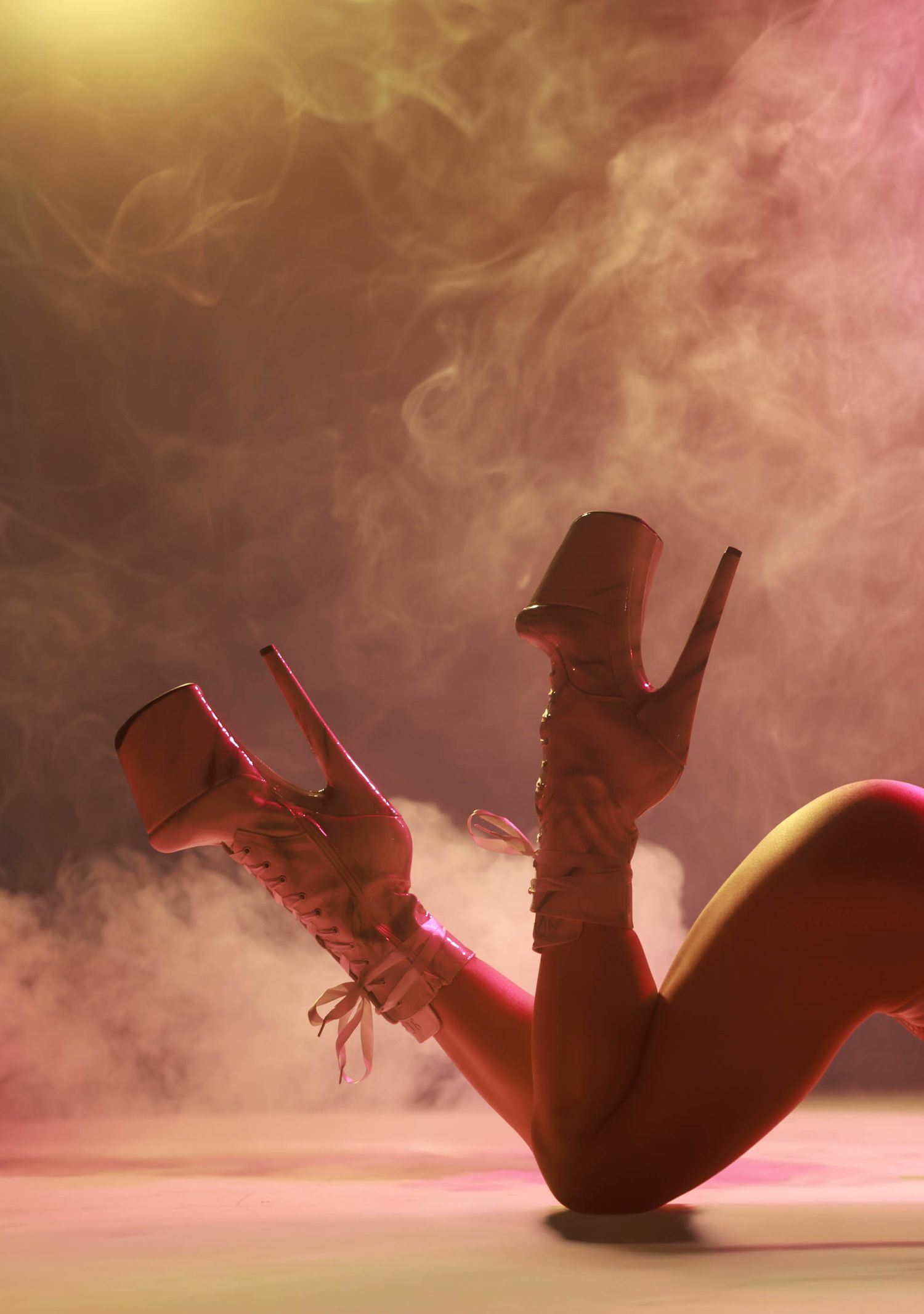 A dancer lies on stage with legs raised wearing tall platform heels amid dramatic pink smoky lighting.