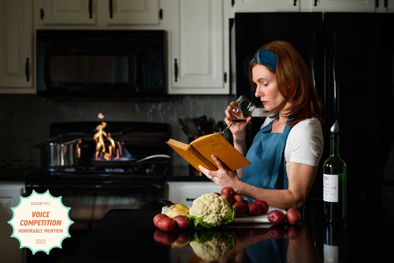 Self portrait study reading instead of cooking by Tracey Richvalsky, Rhythm In Light Photography. Honorable mention, Voice competition 2022.