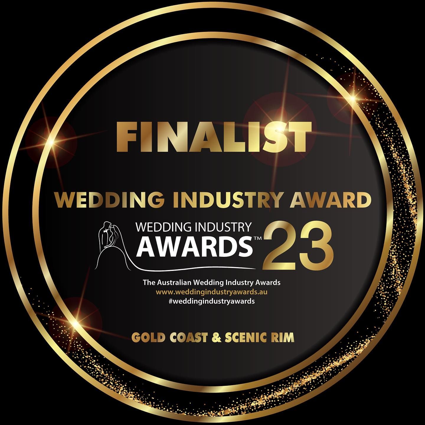 Gold circular award badge for Wedding Industry Award 2023 finalist with sparkle effects.