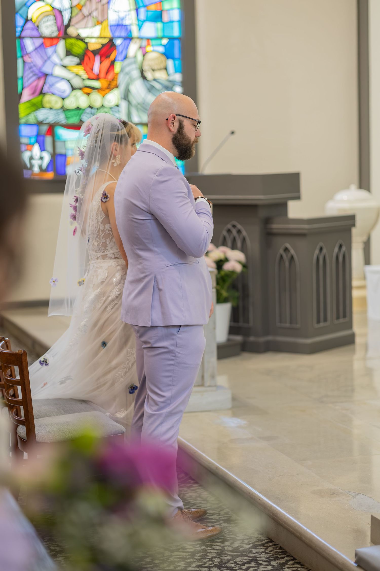 Bride and groom sharing joyful moments on their wedding day with timeless portraits, candid emotions, and elegant details.