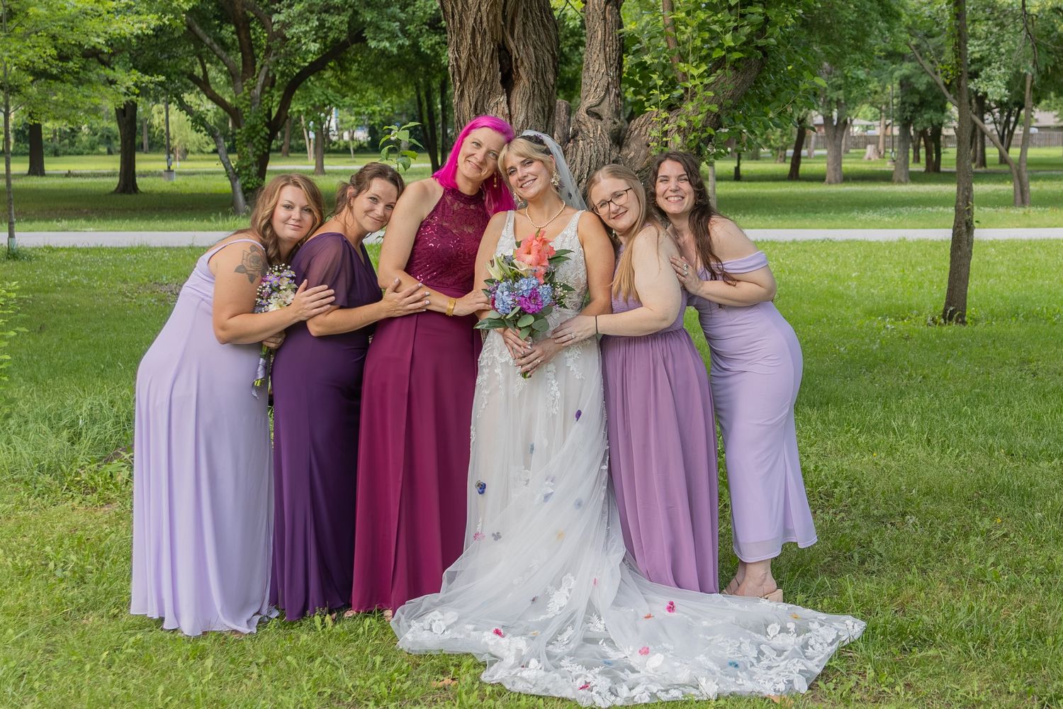 Bride and groom sharing joyful moments on their wedding day with timeless portraits, candid emotions, and elegant details.