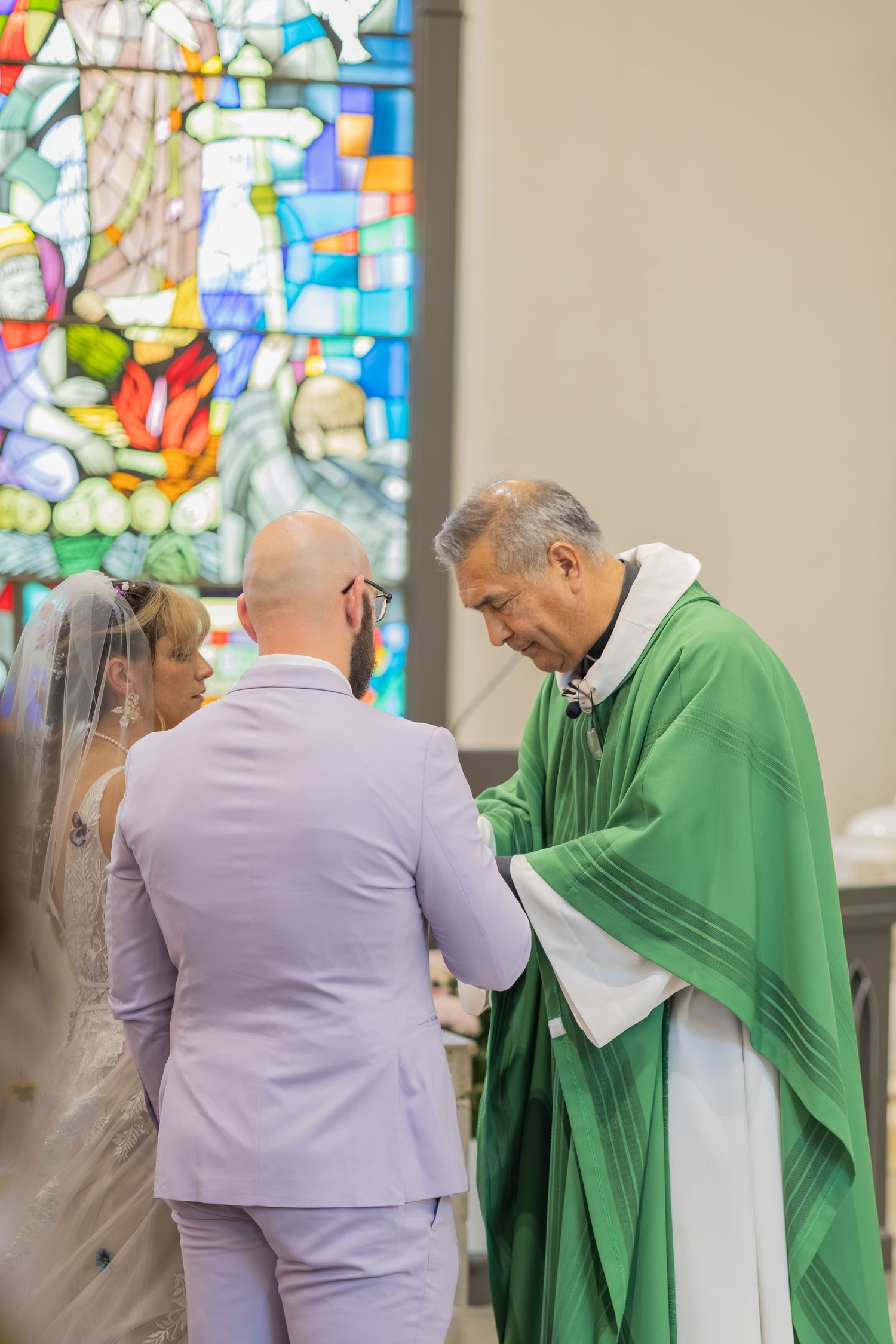 Bride and groom sharing joyful moments on their wedding day with timeless portraits, candid emotions, and elegant details.