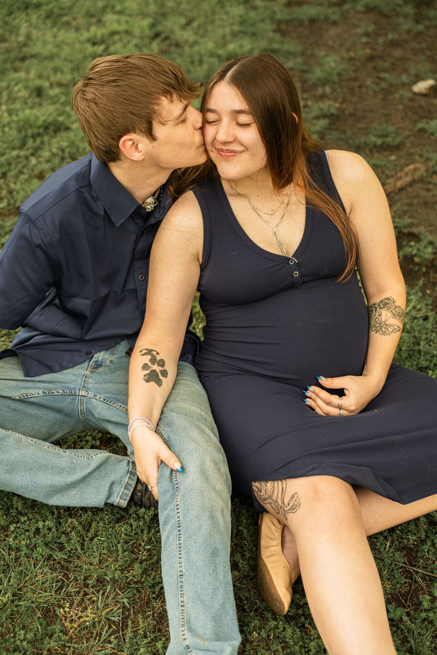Expecting mother during a maternity session with natural posing, soft light, and timeless portraits celebrating motherhood.